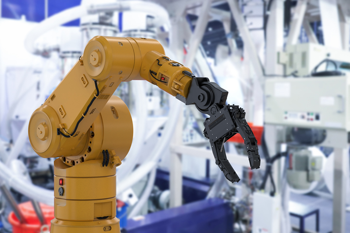 robotic arm in electronics manufacturing plant